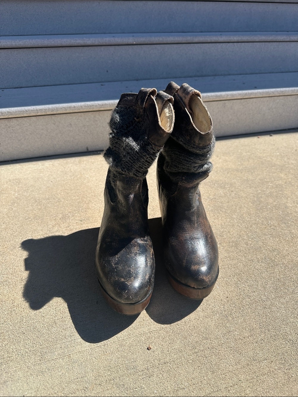 Vintage distressed leather wedge boots